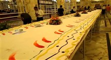 آماده‌سازی کیک غدیر در حرم امام علی(ع)