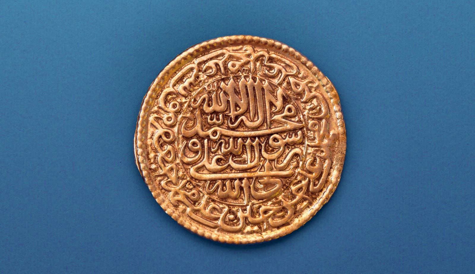 خوشنویسی و ضرب سکه با عبارت علی ولی اللّه